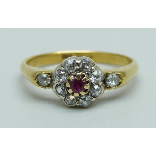 968 - An 18ct gold, ruby and diamond cluster ring, 2.9g, O