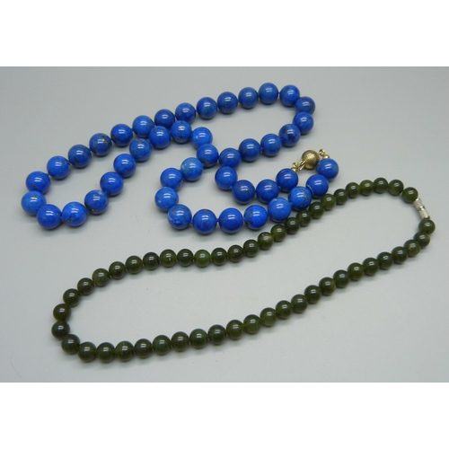 969 - A lapis lazuli bead necklace, 12.2mm diameter beads, and a jade necklace