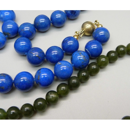 969 - A lapis lazuli bead necklace, 12.2mm diameter beads, and a jade necklace