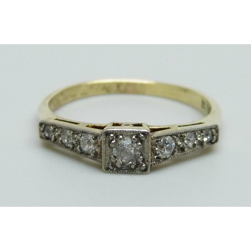 971 - An Art Deco 18ct gold, seven stone diamond ring, 2.3g, L