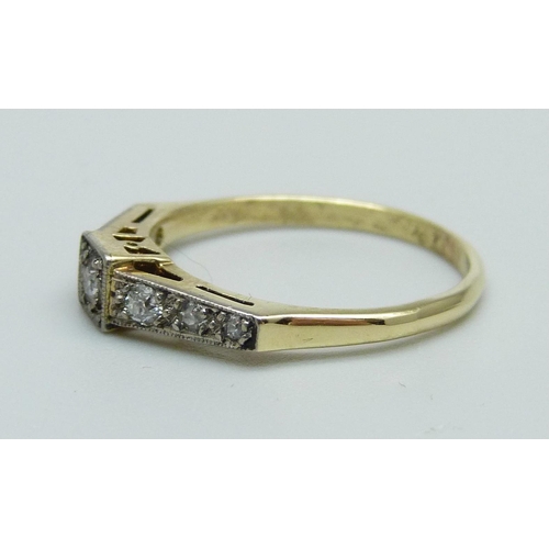 971 - An Art Deco 18ct gold, seven stone diamond ring, 2.3g, L