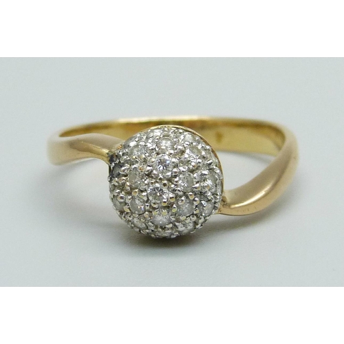 975 - A yellow metal and diamond cluster ring, 3.3g, L