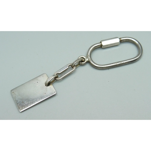 976 - A silver and enamel key ring