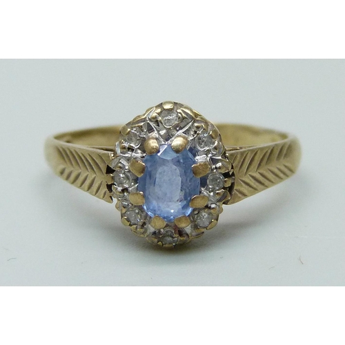 983 - A 9ct gold, topaz and diamond ring, 2g, N