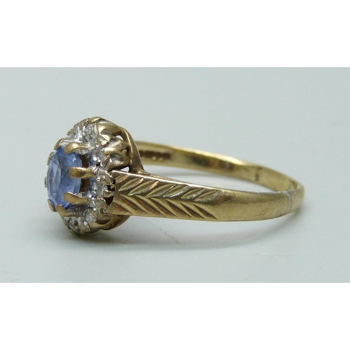 983 - A 9ct gold, topaz and diamond ring, 2g, N