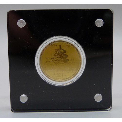 994 - A Chinese limited edition 999 gold 2023 Climbing Panda gold proof coin, with certificate