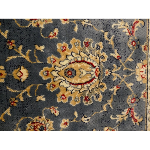 1323 - A duck egg blue ground Cashmere all over floral design rug, 170 x 120cm