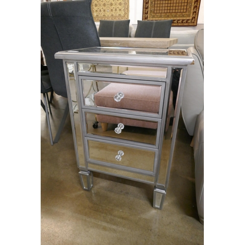 1367 - A silver mirrored three drawer chest