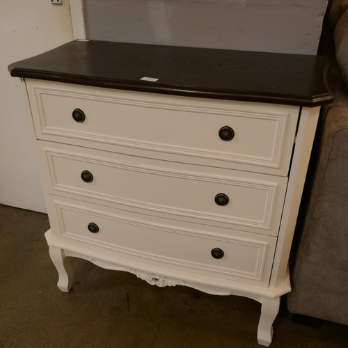 1374 - A three drawer chest with contrast top