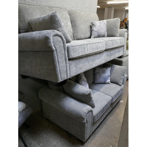 1384 - A Kylie light grey three seater and two seater sofa *This lot is subject to VAT