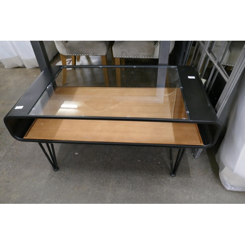 1449 - A glass topped metal coffee table