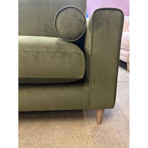 1494 - Green velvet three seater sofa