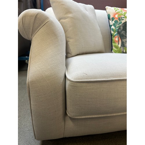 1497 - Pair of cream compact two seater sofas