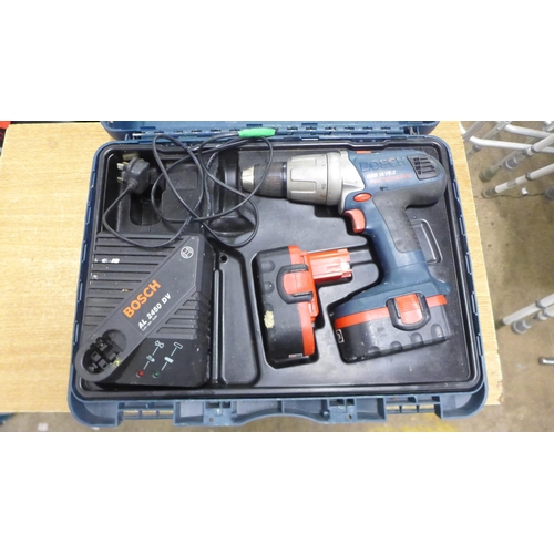 2004 - A Bosch GSB 18 VE-2 professional cordless power drill with 2 x 18v rechargeable batteries, battery c... 