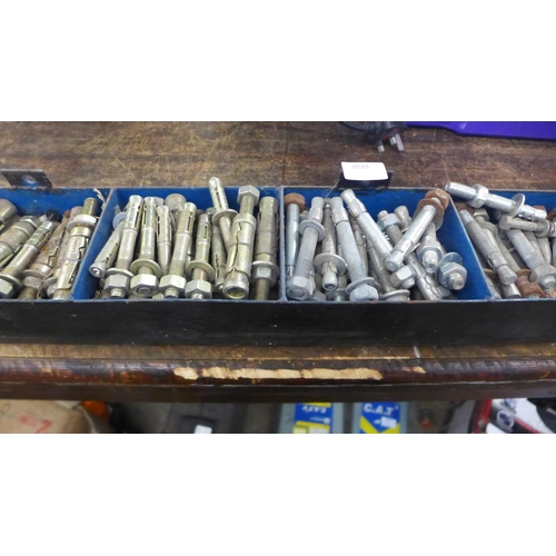 2039 - A large quantity of fixing kits and anchor bolts etc.
