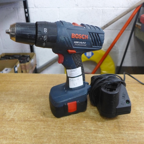 2057 - A Bosch GSB 14,4-2 Professional cordless drill with battery and charger