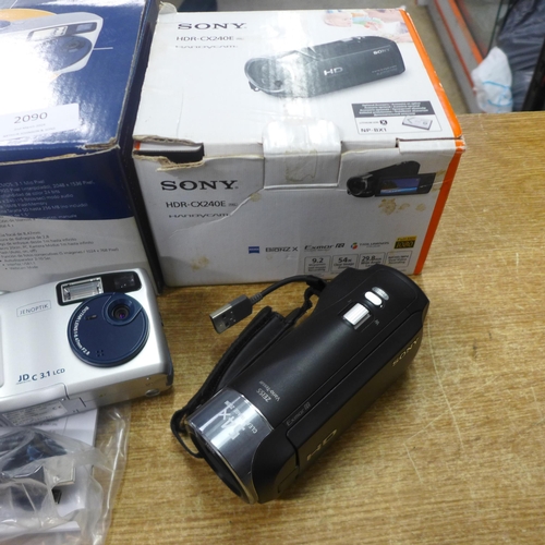 2090 - A Sony Handycam video camera (HDR-CX240E) and Jenoptik 3.1mp 4x digital zoom digital camera