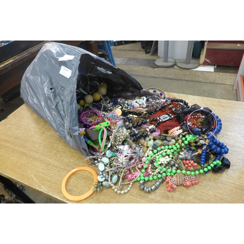 2104 - A 10kg bag of costume jewellery