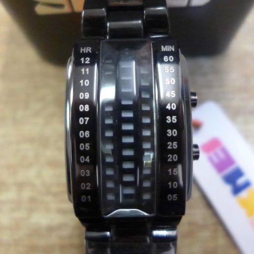 2114 - A Skmei illuminated Binary watch, boxed