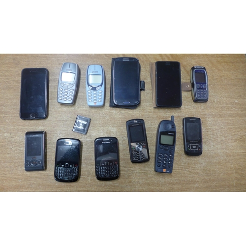 2119 - A collection of phones including an iPhone, Samsung, two Blackberry Curves, Nokia, etc.