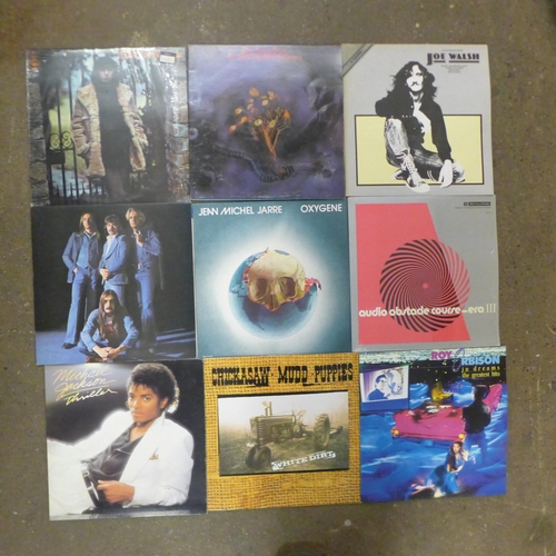 2122 - 60 Assorted LP records including UB40, Dexys Midnight Runners, Lou Reed, Eric Clapton, Michael Jacks... 