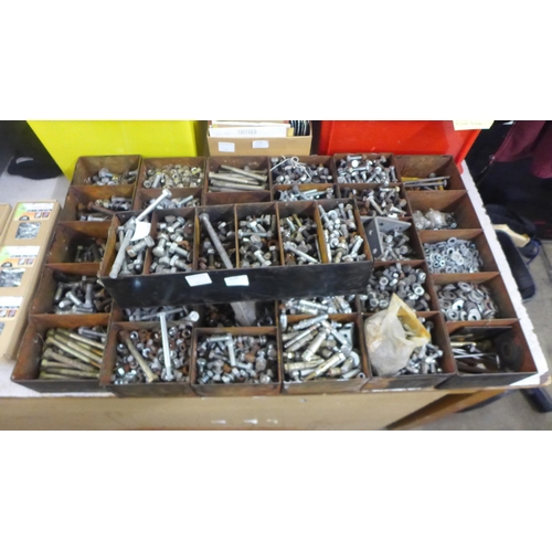 2125 - A large quantity of fixing kits, nuts, bolts, washers, shield anchors etc.