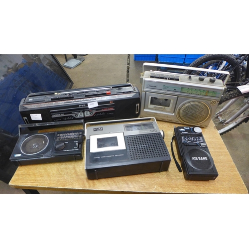 2135 - A quantity of portable radios including a Ferguson 3 band radio cassette recorder, a Steepletone SAB... 