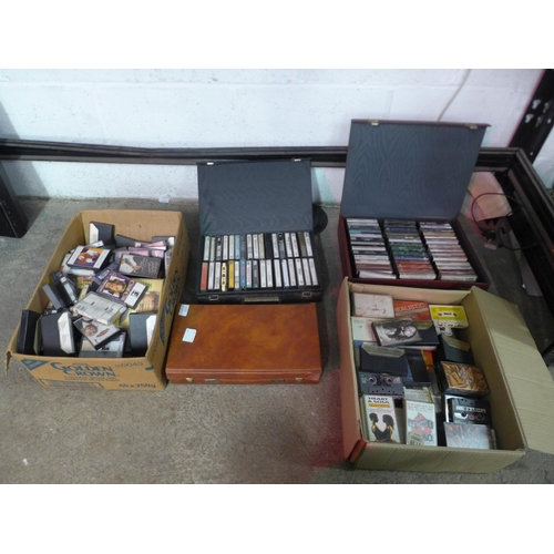 2150 - A large quantity of assorted cassette tapes in a variety of different genres