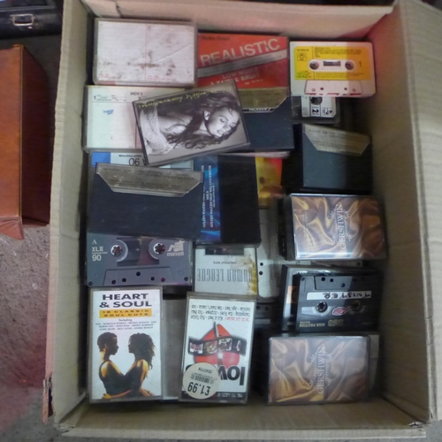 2150 - A large quantity of assorted cassette tapes in a variety of different genres