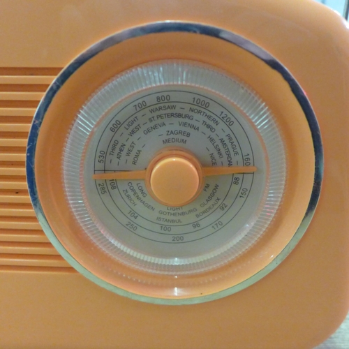 2153 - A Steepletone neon orange vintage style radio