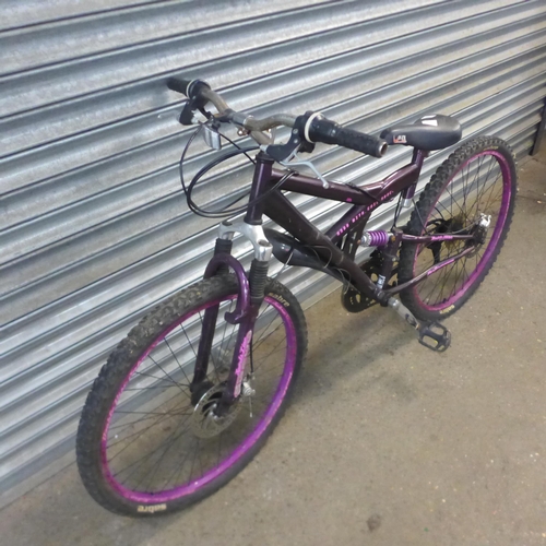 2202 - A Sabre X500 mountain bike with coil shock duel suspension and twin disc brakes