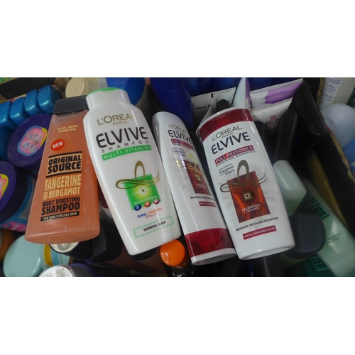 2397 - A box of various creams including: Nivea moisturising cream, Right Guard Extreme shower gel, Garnier... 