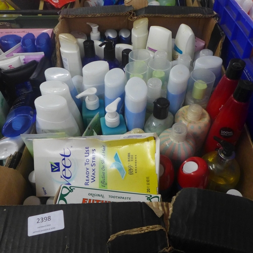 2398 - A box of bathroom items including: Euthymol toothpaste, St. Ives body wash, Hand Safe hand sanitiser... 