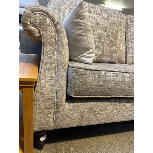 1520 - A mink upholstered three seater sofa