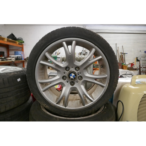 2326 - A set of four front and rear BMW M Sport alloy wheels and tires (225/40/19) and (235/45/19)