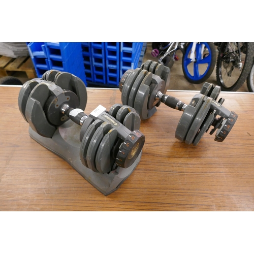 2341 - A set of Nautilus adjustable weight dumbbells