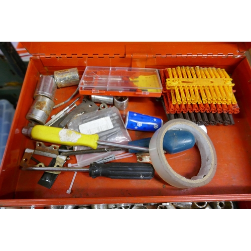 2363 - A red metal tool box with various sockets and drill bits