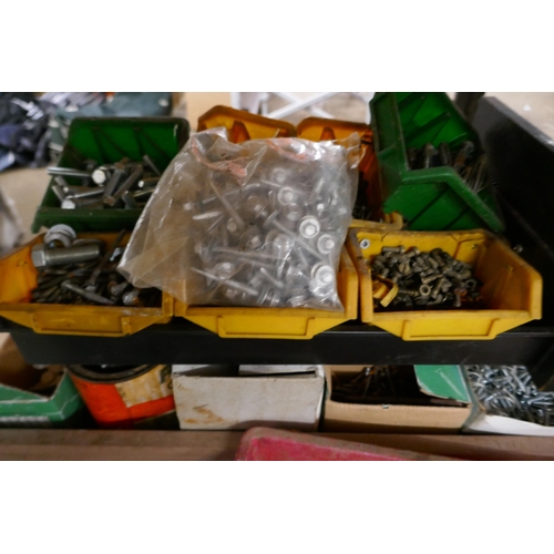 2411 - A large quantity of fixing kits, nails, screws, etc.