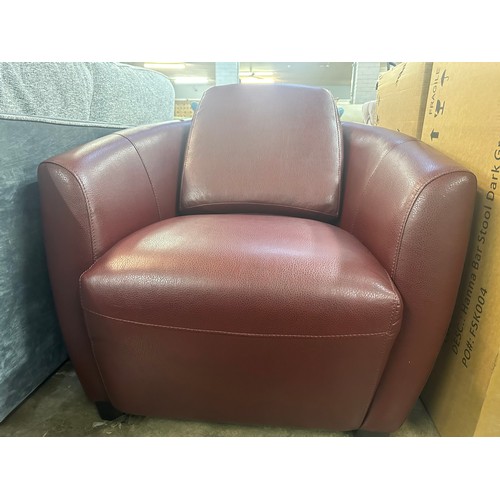 1409 - A Carezza Sputnik leather armchair