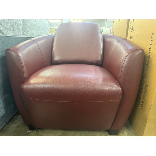 1410 - A Carezza Sputnik leather armchair