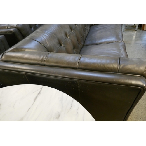 1550 - Vintage flint leather buttoned three seater sofa, two seater sofa and armchair - damaged leather