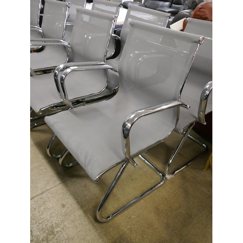 1574 - Eight chrome and grey chairs