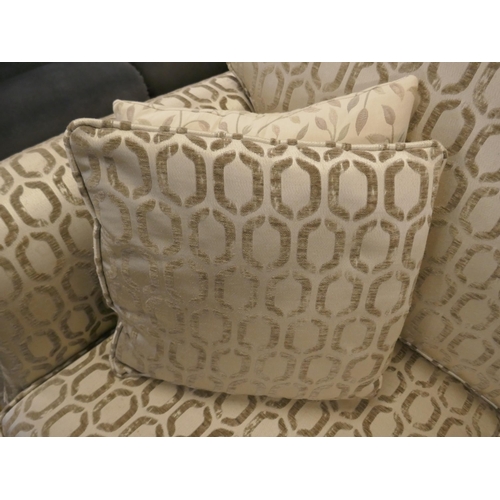 1579 - A light mink velvet two seater sofa