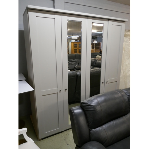 1598 - A grey and mirrored four door wardrobe* This lot is subject to VAT