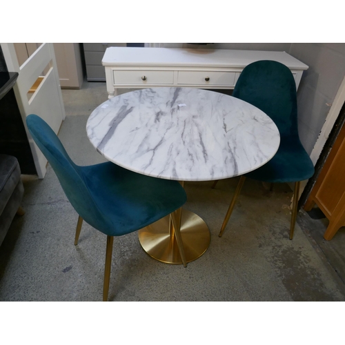 1606 - A marble effect circular table with two blue velvet upholstered chairs