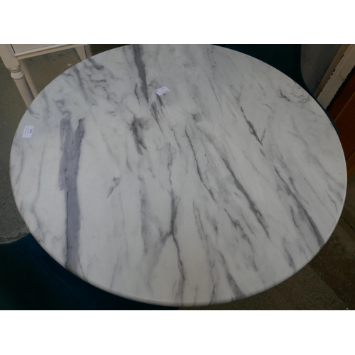 1606 - A marble effect circular table with two blue velvet upholstered chairs