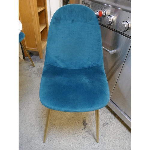 1606 - A marble effect circular table with two blue velvet upholstered chairs