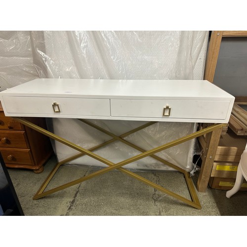 1594 - A white two drawer console table with gold legs