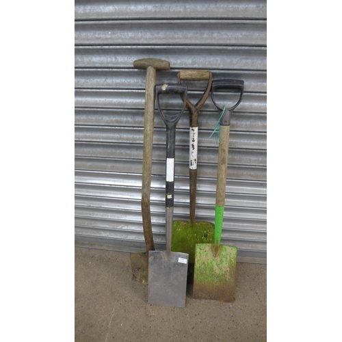 2243 - Approx. 10 garden tools including a pick axe, spades, cutters, etc.
