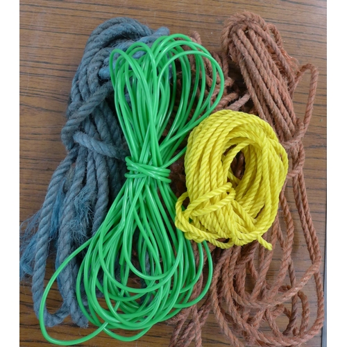 2253 - Three assorted lengths of nylon rope, four assorted plastic clothes lines, two 180ml tins of iron ga... 